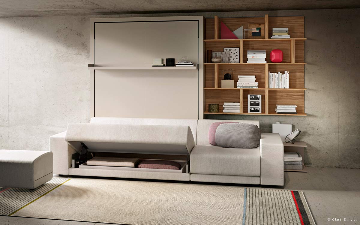 Cama abatible de matrimonio con gran sofá de estilo nórdico desenfundable.